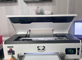 Procolored DTF Printer with oven and spare capping station. Can be seen working