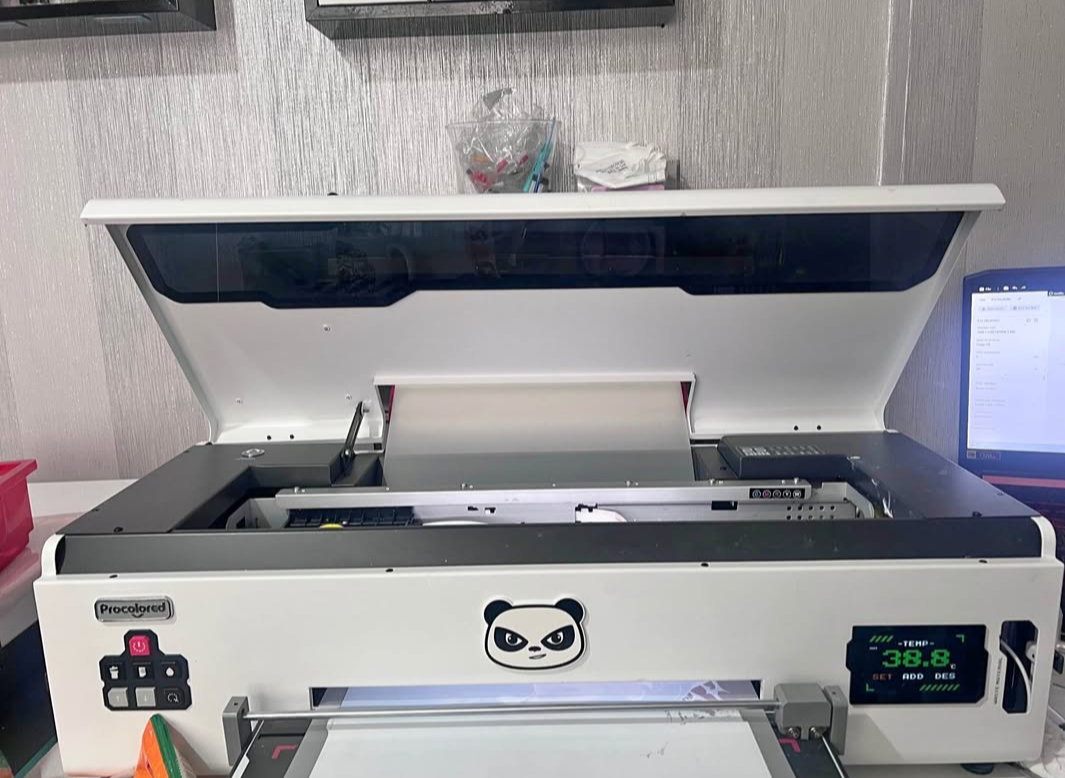 Procolored DTF Printer with oven and spare capping station. Can be seen working